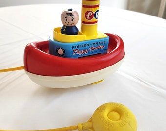 Fisher Price Vintage Tuggy Tooter Pull Toy 1967 - Etsy