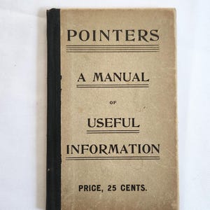 May include: A set of three ceramic mugs with a speckled, cream-colored glaze. Each mug features a different hand-painted design: a blue and green leaf, a yellow flower, and a red berry. The mugs have a simple, rounded shape.