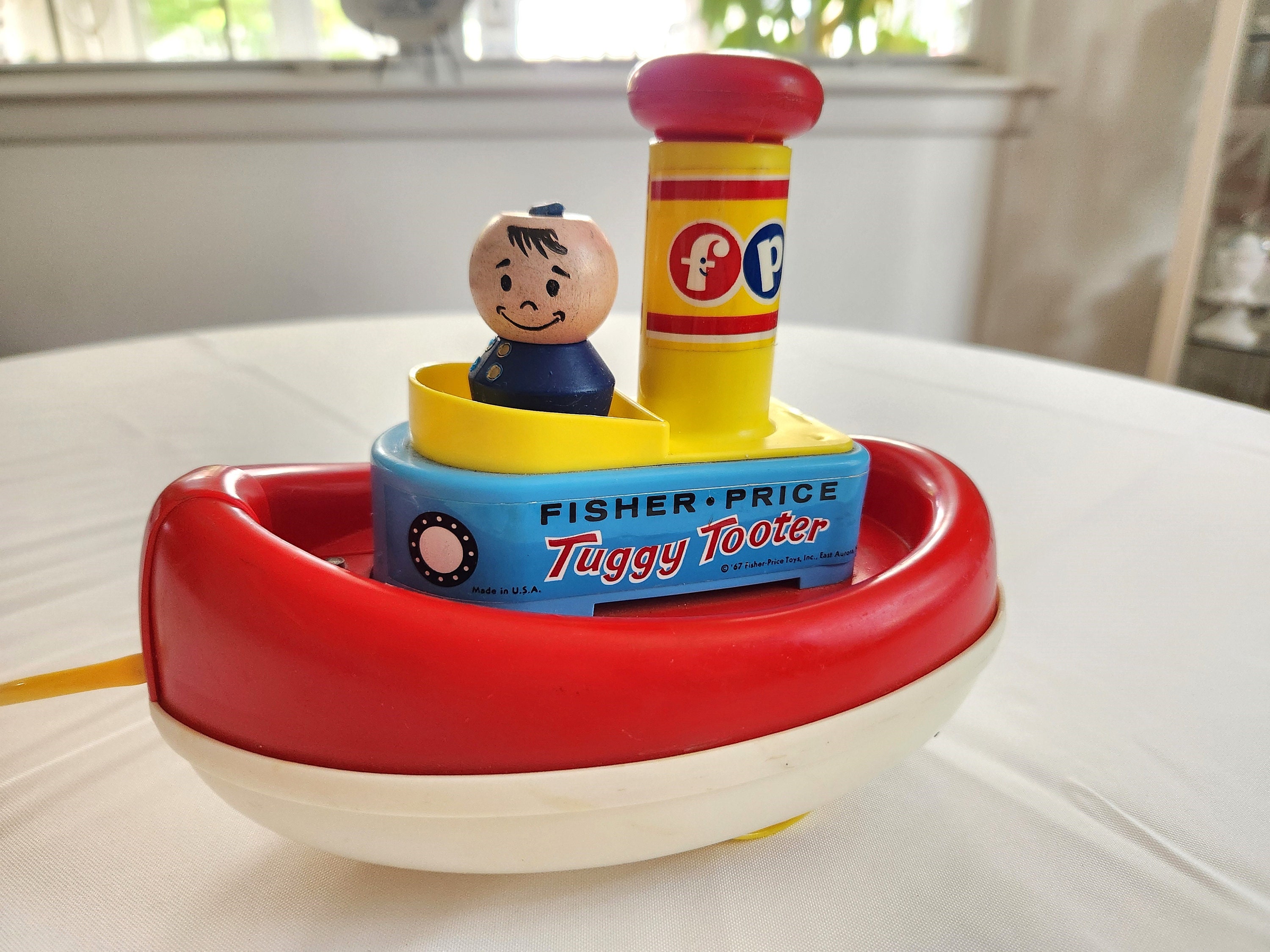 フィッシャープライス　ヴィンテージ　TUGGY TOOTER トイストーリー フィッシャープライス ヴィンテージ TUGGY TOOTER トイ