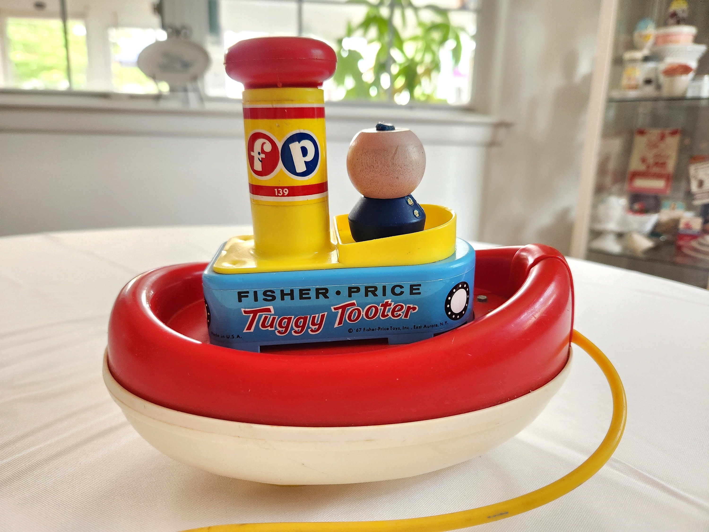 フィッシャープライス　ヴィンテージ　TUGGY TOOTER トイストーリー フィッシャープライス ヴィンテージ TUGGY TOOTER トイ