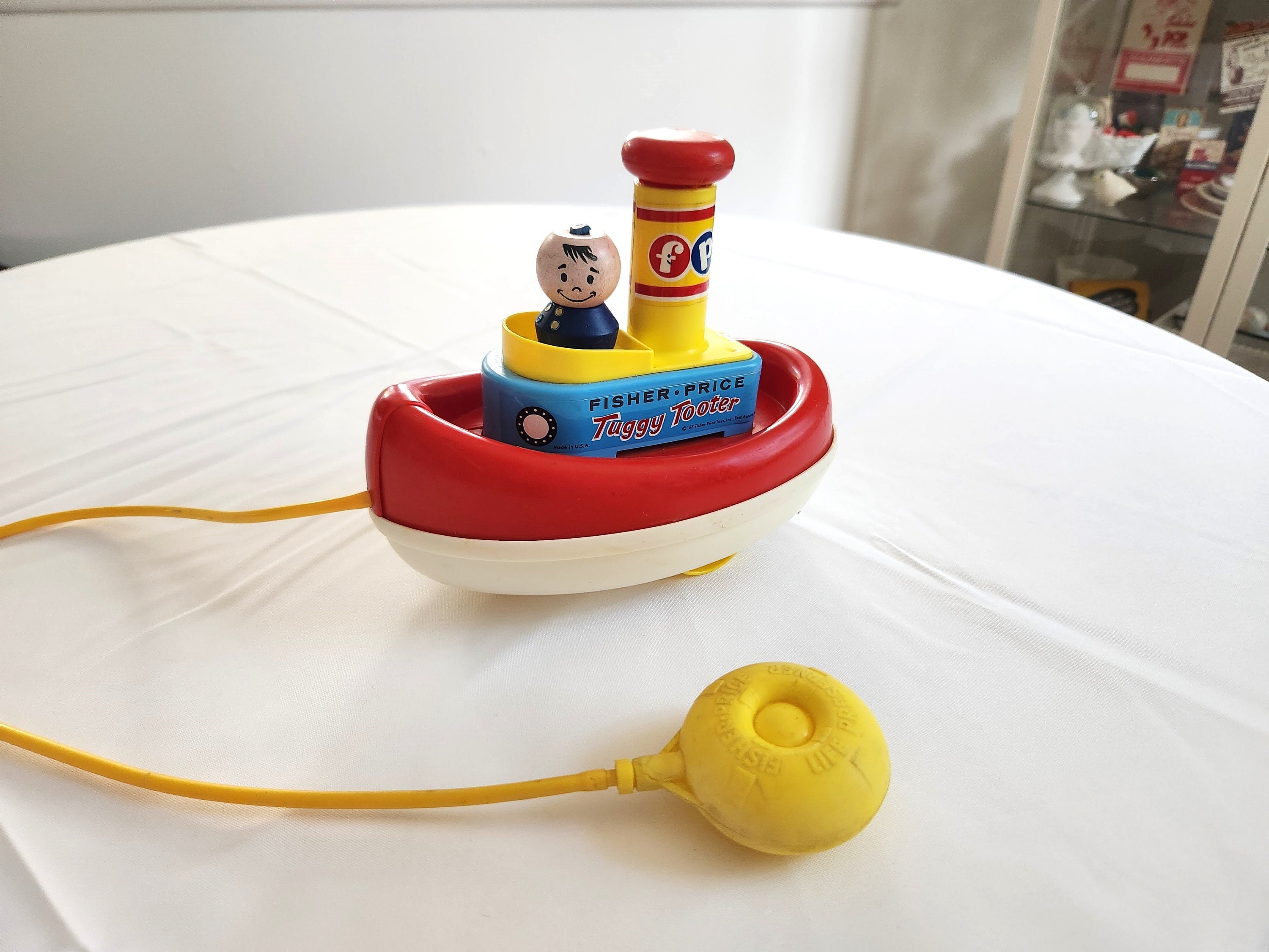 Vintage Tuggy Tooter Boat Pull Toy --- Retro 1960s Fisher