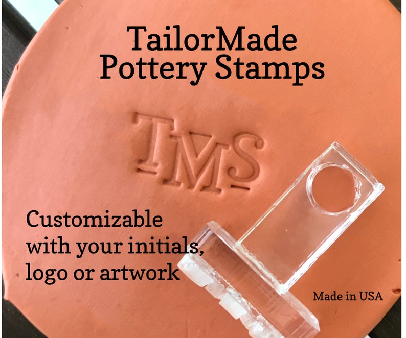 May include: A clear plastic pottery stamp with the letters "TMS" imprinted on a terracotta surface. The text "TailorMade Pottery Stamps" and "Customizable with your initials, logo or artwork" is also visible. The stamp is made in the USA.