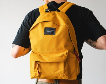 mustard yellow backpack