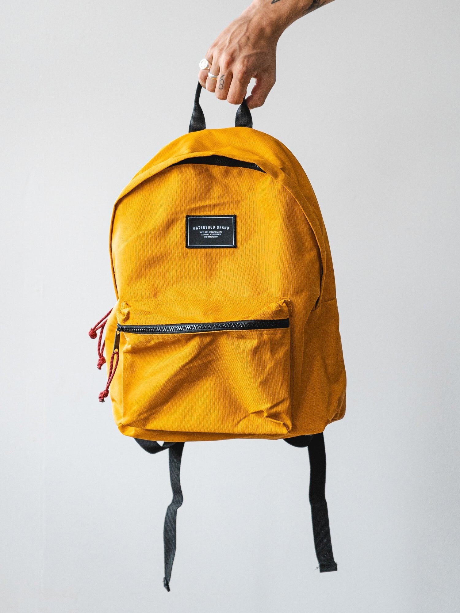 mustard yellow backpack