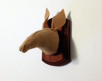 Aardvark faux taxidermy on wooden mount