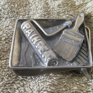 Fivela de aço para pintor vintage 1982 &quot;Pincel e rolo em uma panela&quot; Série No. 852 da The Great American Buckle Co.