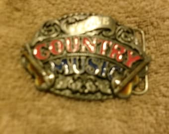 Hebilla vintage de acero macizo "I Love Country Music" de 1988, de Siskiyou Buckles.
