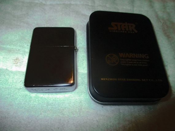 star cigarette lighter Vintage 1988 Star Premium Chrome Cigarette Lighter in It's Original 