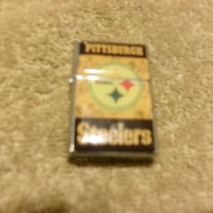 steelers cigarette case Zippo NFL Pittsburgh Playbook Design Black Matte Windproof Lighter quality lighter combines functionality with team spirit steelers cigarette case Pittsburgh Steelers
