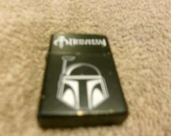 Encendedor de cigarrillos negro Bounty Hunter vintage de 2005 de Team Pistols Since 1993.