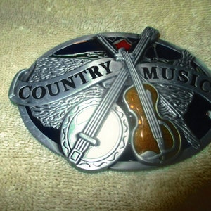 Musique country lager vintage sur carte des États-Unis, fond « Banjo noir émaillé blanc, guitare marron clair », boucle en acier