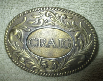 Vintage 1977 CRAIG Brass Buckle on Flower Background by The Kinney Co.
