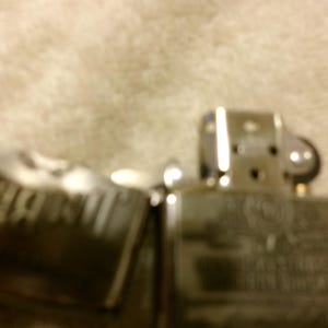 May include: A set of three ceramic vases in varying heights and shapes. The vases are glazed in a matte white finish, offering a minimalist aesthetic. The tallest vase is approximately 10 inches high.