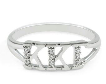 May include: A silver ring with the Roman numeral XXI set in a band with small diamonds.