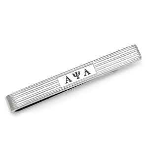 May include: Silver tie bar with a rectangular engraved plate that reads "ΑΨΛ".