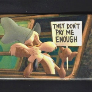 Wile E. Coyote holds a sign which says 'they don't pay me enough.'     Pinback button or magnet