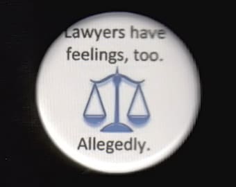 1.25 inch - lawyers have feelings too - allegedly.   Pinback button or magnet
