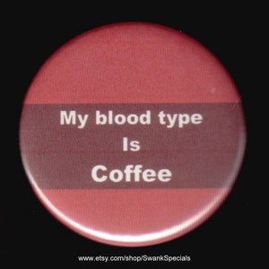 May include: A red and brown button with the text "My blood type is Coffee" in white.
