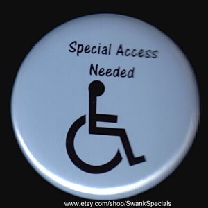 May include: A white button with a black wheelchair symbol and the text "Special Access Needed".