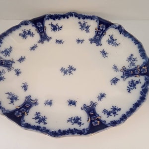 Antique Diana blue flow plate  oval 16" by 12"