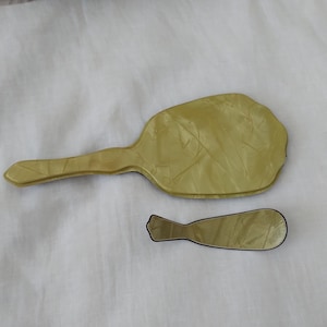 Antique Celluloid Yellow Marbled Amber Hand Held Mirror with matching shoe horn
