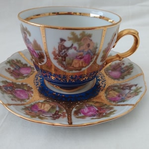 Vintage Schaller Bavaria Porcelain Fragonard Love Story royal blue gold white tea cup and saucer Western Germany