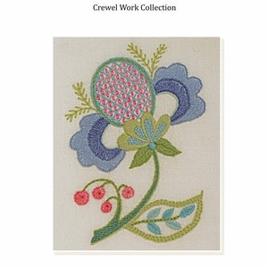 May include: Blue floral embroidery pattern with green leaves and pink berries. The design measures 12.5cm by 8.5cm wide. Crewel Work Collection by Anna Scott 2013.