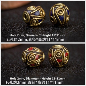 May include: Two sets of decorative beads with gold accents. The beads are approximately 11 mm in diameter and 11 mm in height. The beads have a dark brown base with either blue or red accents. The hole in each bead is approximately 2 mm in diameter.  E:孔约2mm,直径*高约11*11mm F:孔约2mm,直径*高约11*11mm