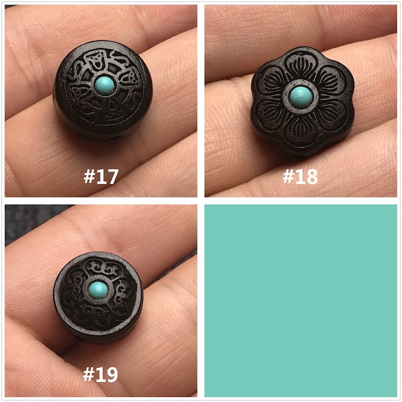 May include: Three round wooden beads with intricate carvings and a turquoise stone inlay. The beads are dark brown and have a glossy finish.