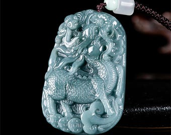 富の麒麟またはQilin麒麟はお金を吸収します未処理の天然翡翠の 