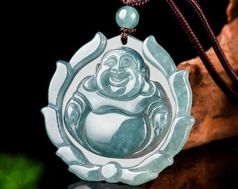 May include: A jade green pendant necklace featuring a carved laughing Buddha figure surrounded by a lotus flower design.