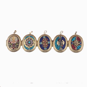 May include: Five oval-shaped brass locket pendants with intricate designs. Each locket features a different colorful mosaic pattern with turquoise, blue, red, and gold accents.