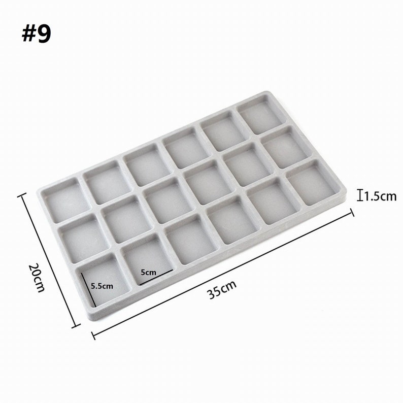 May include: Gray rectangular tray with 20 square compartments. The tray measures 11.5 inches long, 5.5 inches wide, and 1.5 inches high.