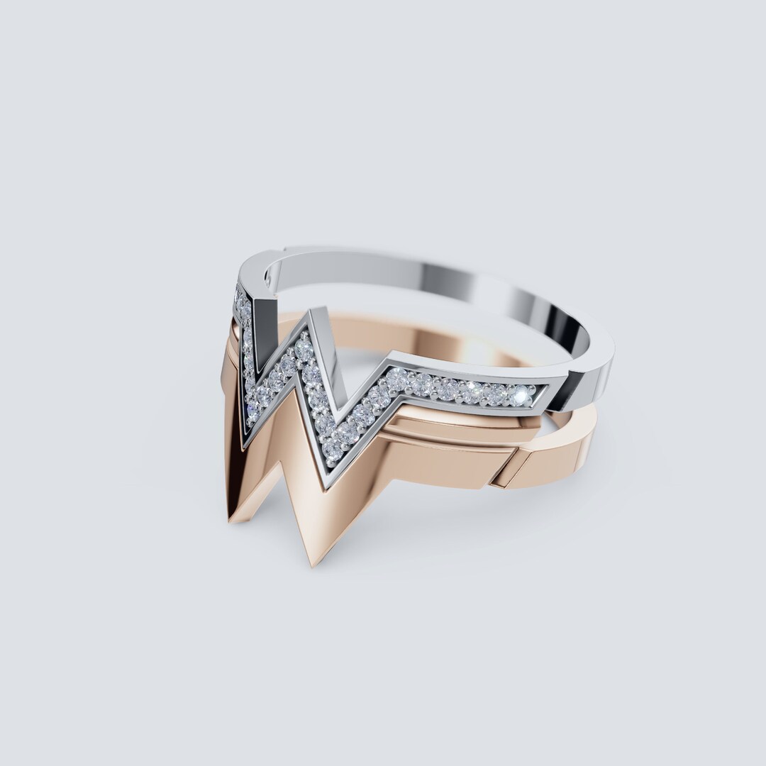 Wonder Woman Wedding Ring a Symbol of Strength Love and Female Empowerment Featuring the Iconic Emblem Available in Gold and Silver Etsy