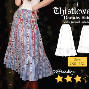 May include: A long, flowing skirt with a blue and white gingham pattern, accented by vertical red stripes with floral designs. The skirt has a ruffled hem and is labeled "Dorothy Skirt" with a video tutorial. Sizes range from 2XS to 5XL.