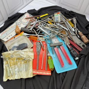 May include: A large collection of assorted hand tools including various wrenches, screwdrivers with wooden and plastic handles, a coaxial cable wire stripper in packaging, and a set of small metal tools in a plastic bag labeled The Hex Key Wrench Set.
