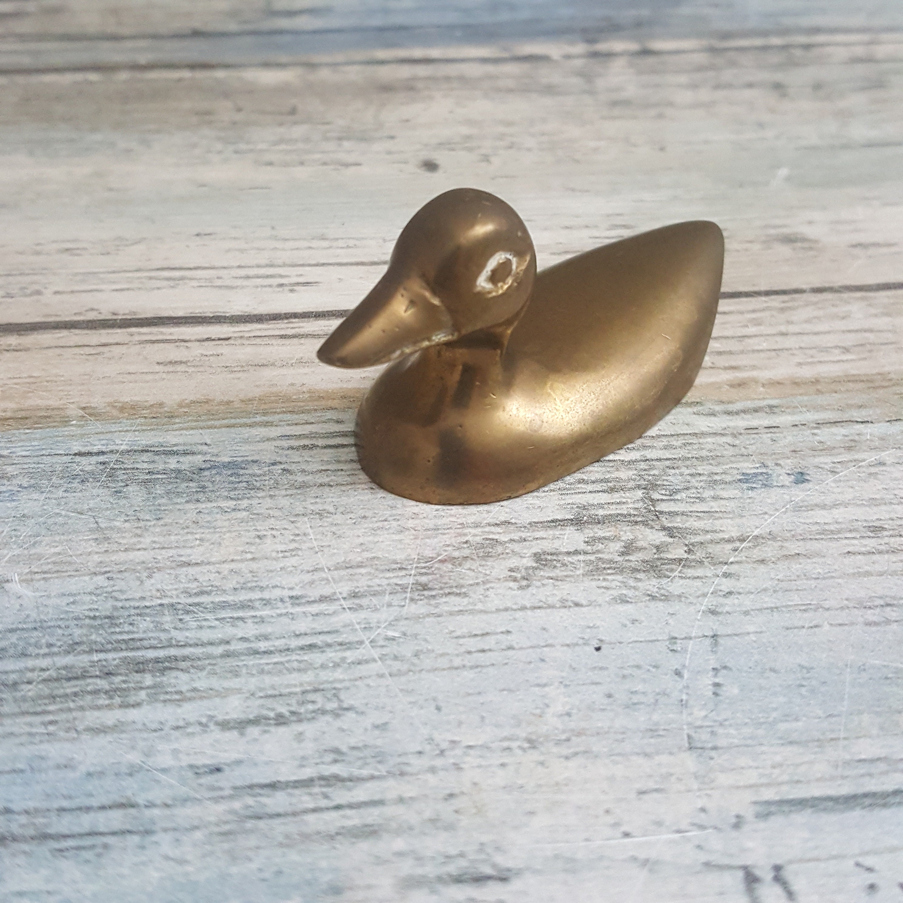 solid brass duck figurines