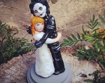 beetlejuice and lydia hand