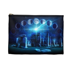 May include: A blue and black zippered pouch with a design of a starry night sky with a crescent moon and a stonehenge monument.
