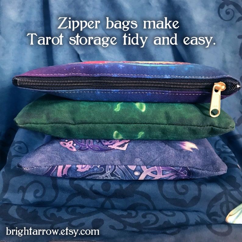 May include: Three zippered bags made of canvas fabric with different colorful patterns. The bags are stacked on top of each other. The top bag has a purple, blue, and green pattern. The middle bag has a green pattern. The bottom bag has a blue and purple pattern. The text "Zipper bags make Tarot storage tidy and easy." is displayed above the bags. The text "brightfarrow.etsy.com" is displayed below the bags.