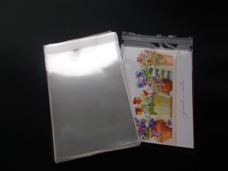 100 5 1/4 x 7 1/4 Clear Resealable Cello Bag Envelope for 5x7 Photos, Art Prints, A7 Card, Greeting Cards, Acid Free image 1