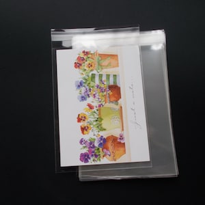 100 5 1/4 x 7 1/4 Clear Resealable Cello Bag Envelope for 5x7 Photos, Art Prints, A7 Card, Greeting Cards, Acid Free image 4