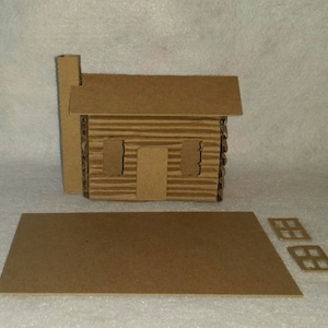 Cabaña de madera estilo Putz de cartón de Little Village