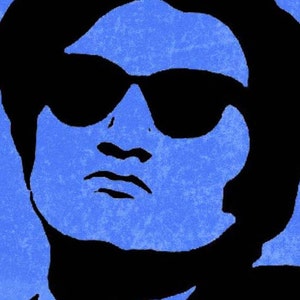 May include: A stylized pop art portrait of a person wearing sunglasses. The image features a blue background with a textured effect, and the face and sunglasses are rendered in solid black, creating a striking contrast.