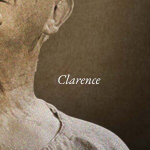 May include: A sepia-toned image featuring a portion of a person's head and shoulder. The text "Clarence" is written in a cursive font. The person is wearing a light-colored garment.