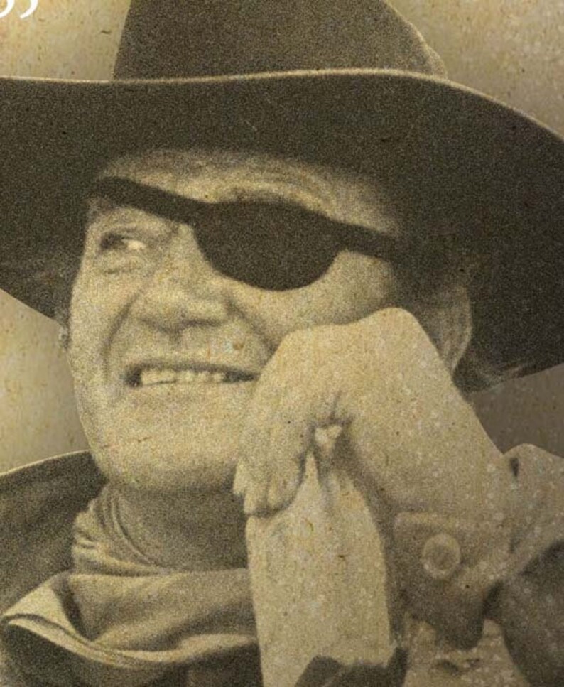 May include: Sepia-toned portrait of a man wearing a cowboy hat and an eye patch. The man is smiling, with his hand resting on his chin. The image has a vintage, weathered appearance.