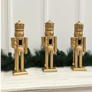 Golden Grandeur: The 12&quot; Nutcracker with Staff – A Dazzling Centerpiece for Festive Parties