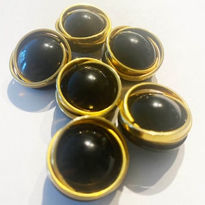 Eyecatching black vintage buttons gold effect wrapped wire edges