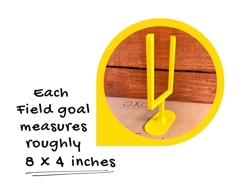 May include: A yellow field goal post, approximately 20 x 10 cm, is shown against a wooden background. The image is set within a yellow circle, with text indicating the dimensions of the goal post.
