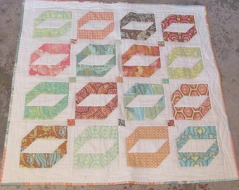 O baby quilt or patchwork wallhanging